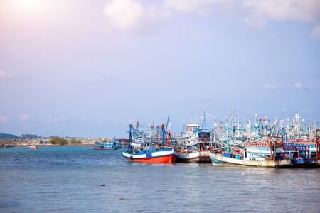 fisherman boats on seascape on seashore in agriculture industryの写真素材
