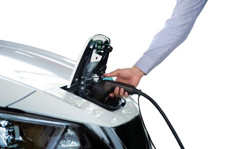 hand hold charger electric vinhicle car for power at station to technology of car on white isolated (include clipping path)の写真素材