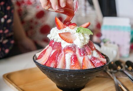 strawbery dessert with icing milk with strawberry sauce serve for sweet dayの写真素材