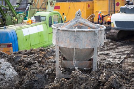 cement tank on soil at construction site. Heavy industry on construction site