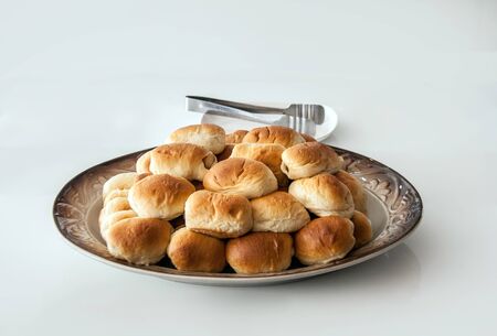 serve brake snack with bread and sausage on plate on white backgroundの写真素材