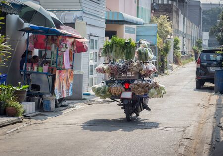 4 march 2017,Bangkok,Thailand. moveable  delivery food shop with motorcycle to sell on out of area departmentstoreの写真素材