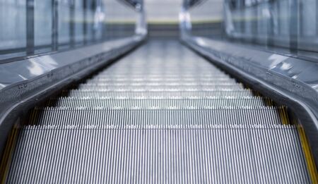 close up escalator stair step for reduce human moving to going up and downd levelの写真素材