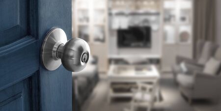 open door to blur living room in banner size, Focus on wood door with lockの写真素材