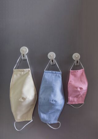 keep fabric mask for protect virus pandemic on refrigeratorの写真素材