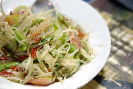 favourite Thai food from salad papaya and chilli tomato and herb in healthy Thai food conceptの写真素材