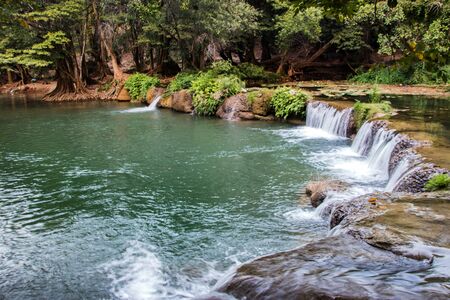 relax landscape of natural waterfal of Thailand for tourismの写真素材