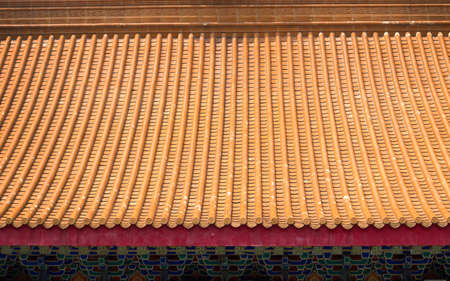 classic Chinese ceremic roof on temple vintage style exterior for backgroundの写真素材