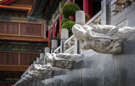 oriental dragon head figure exterior Chinese decoration pupblic temple in asiaの写真素材