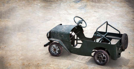 mini car vintage boy toy handmade on outdoor cement in retro style