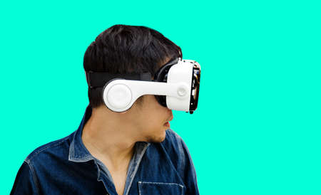 abstract asian man pointing on screen with virtual glasses in VR technology concept(include clipping path)の写真素材