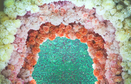 colouful rose flower archway decoration for photo backgdrop in romantic concept