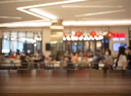 wood table top counter for display food or drink at restaurant background