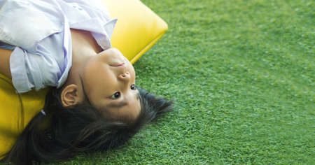 asian girl thinking out of box find creative idea with reflex revert angle of eye view