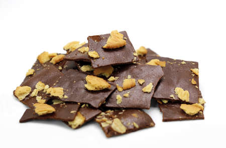 select focus crispy chocolate cracker homemade on white backgroundの写真素材