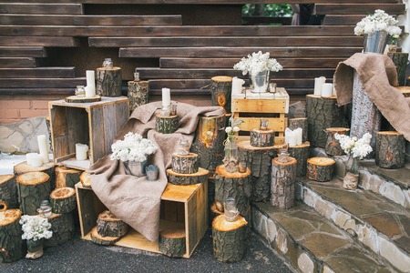 Rustic wedding decor, decorated stairs with stumps and lilac arrangements.の写真素材