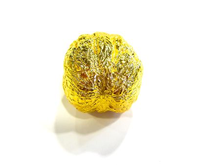 Jewel golden walnut on the white backgroundの写真素材