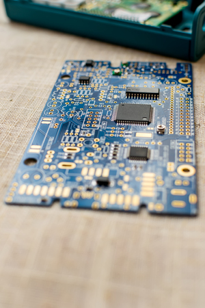 Circuitboard with resistors microchips and smd electronic components - selective focusの写真素材
