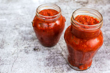 Dish of minced peppers, tomatoes and spices, cooked to a pulp - bulgarian traditional lutenitsaの写真素材
