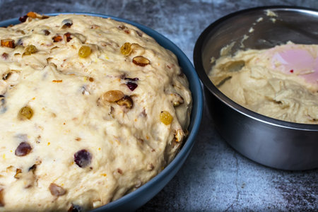 A ball of dough for making a Christmas stollen on a wooden table
