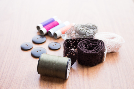 sewing tool on the wooden tableの写真素材