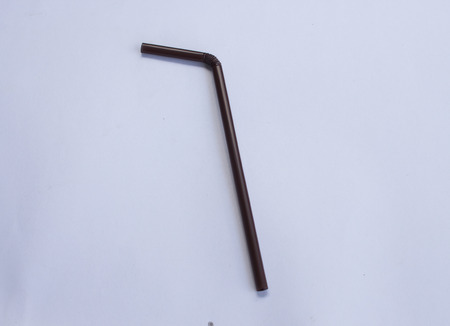 Plastic drinking straw on white backgroundの写真素材