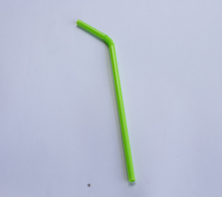 Plastic drinking straw on white backgroundの写真素材