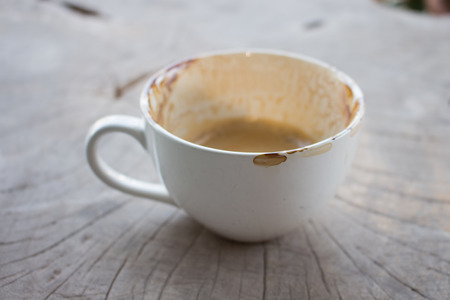 Dirty coffee cup after drinkの写真素材