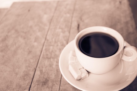 Cup of coffee on the wooden tableの写真素材