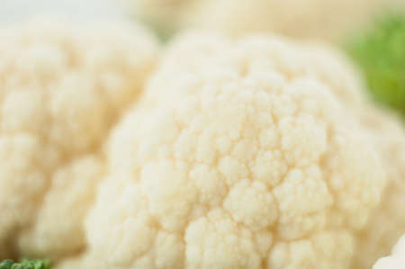 Cauliflower on a light background. Vegetables close-up. Macro photo.の写真素材