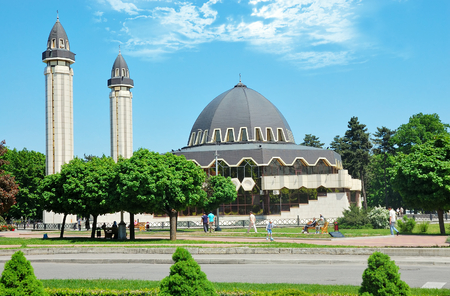 Muslim mosque with minarets against the blue skyのeditorial素材
