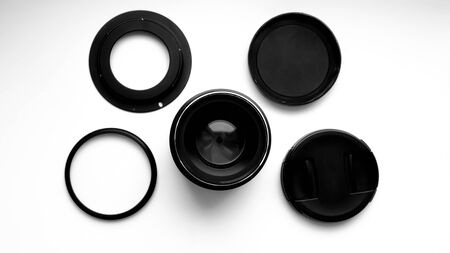 Lens and filters for professional cameras on a white background. View from above .の写真素材