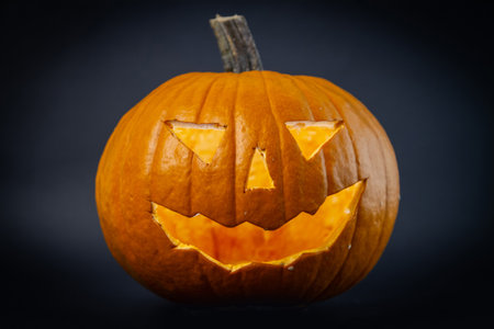 Halloween pumpkin on a black background. Jack O' Lantern.の写真素材