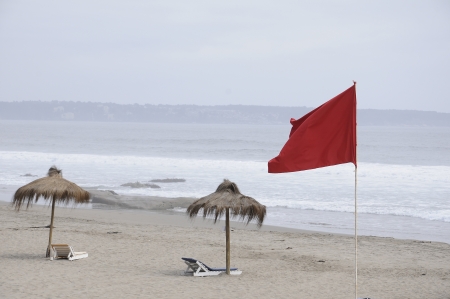 sunshade and red flagの写真素材