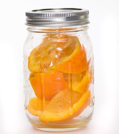 Orange slices in a jarの写真素材