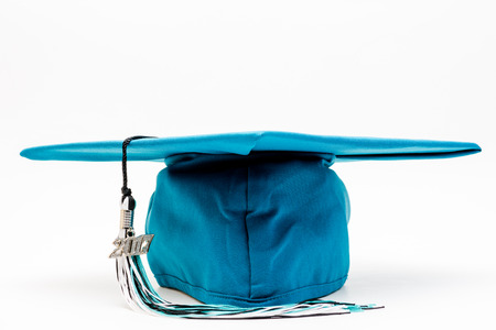 Graduation cap and tassel with white spaceの写真素材