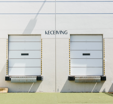 Two receiving doors on loading dockの写真素材