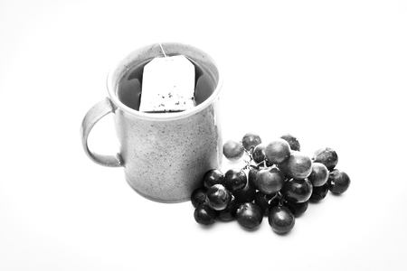 Black and white tea and fruitの写真素材