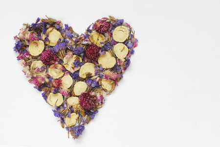 Decorative heart of flowers on a white backgroundの写真素材