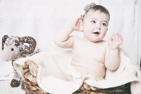 A small child in natural tissue diapers, eco-friendly cotton diapersの写真素材