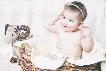 A small child in natural tissue diapers, eco-friendly cotton diapersの写真素材