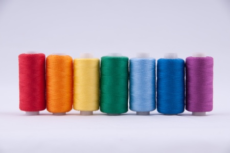 Threads in Babin on a grey background  All the colors of the rainbowの写真素材