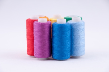 Threads in Babin on a grey background  All the colors of the rainbowの写真素材