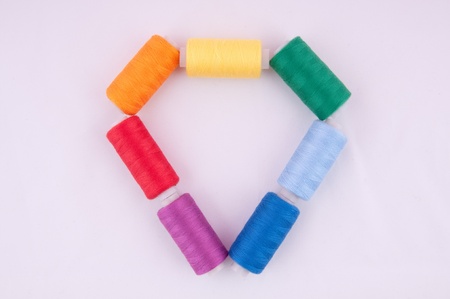 Threads in Babin on a grey background  All the colors of the rainbowの写真素材