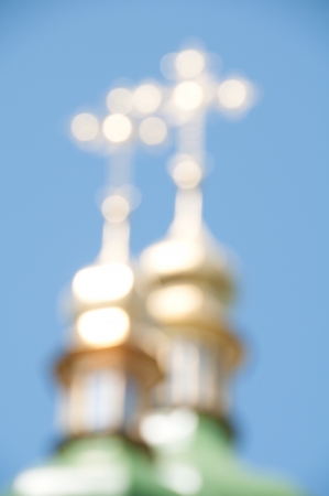 Blurred gold crosses on a background of the sky.の写真素材
