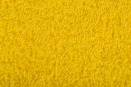 Background of yellow terry towels.の写真素材