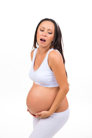 Pregnancy and abdominal pains. Prenatal contractionsの写真素材