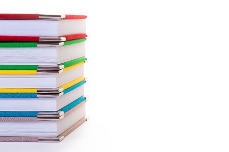 Multicolored book textile cover. Photobooks on a white backgroundの写真素材