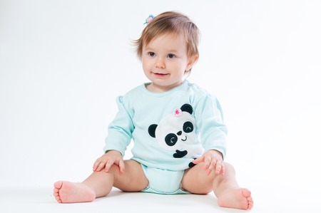 portrait of smiling baby isolated on white backgroundの写真素材