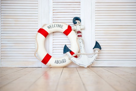 Decor in the style of sea travel, Anchor and lifebuoy, lanternの写真素材